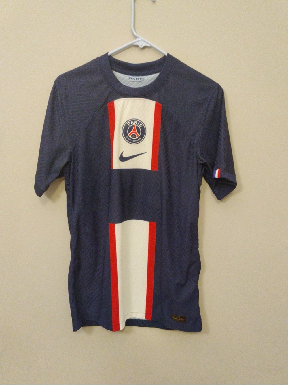 Nike Men's Navy Blue Soccer Jersey with White and Red Center Stripe